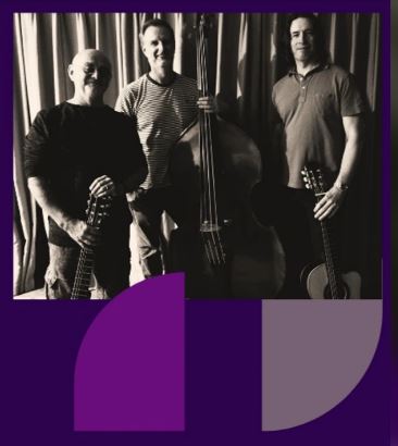 Thee three musicians of The Well Strung Trio stand in front of a curtain facing the camera.