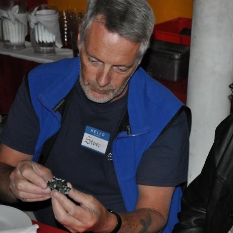 Inspecting an interesting mineral specimen